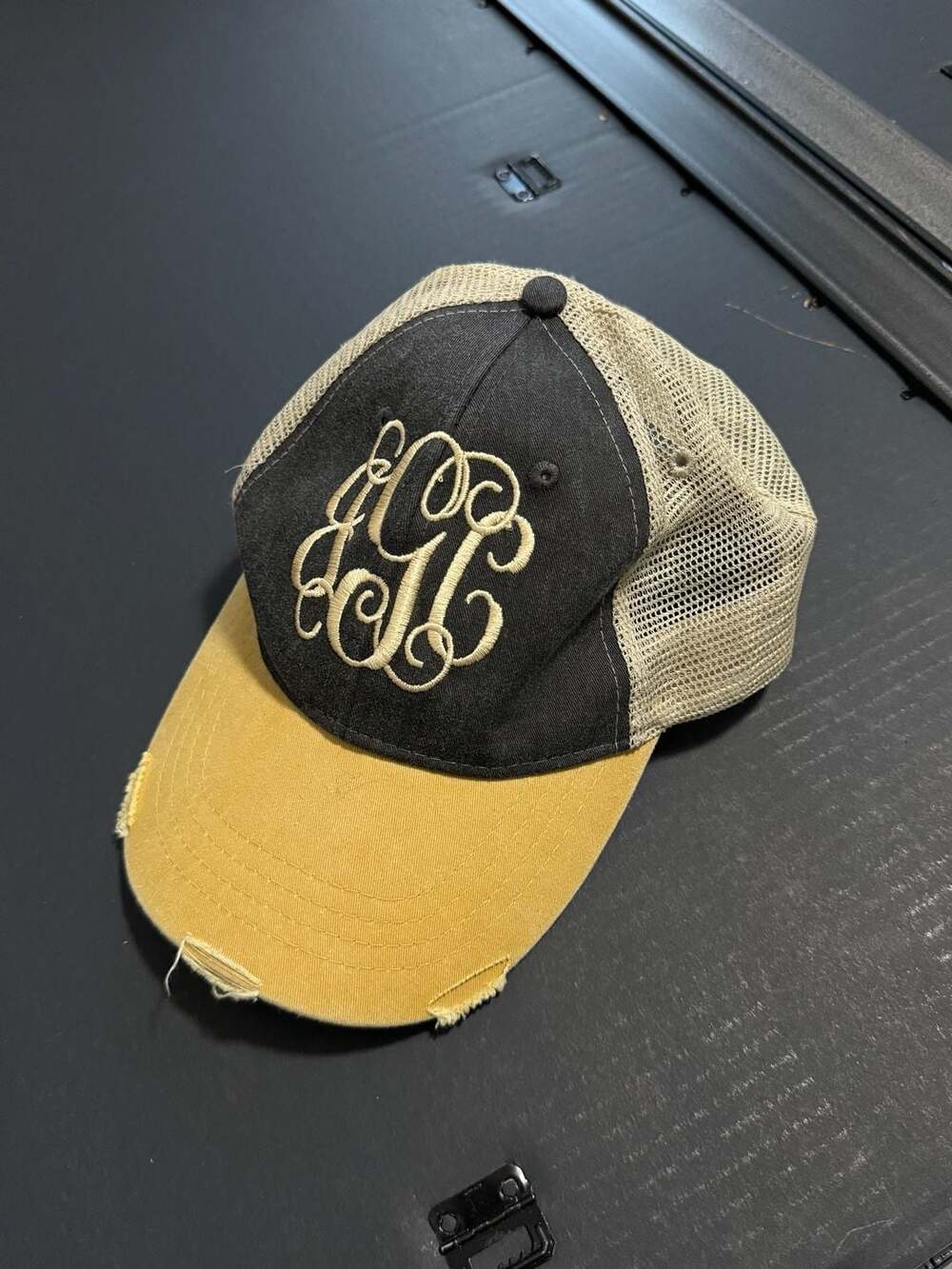 Adams Upscale Fashion Headwear Distressed Trucker Hat with Monogram Embroidery